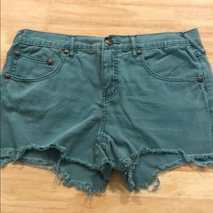 Free People green denim shorts